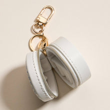 Load image into Gallery viewer, Mini Round Jewelry Travel Case with Keychain – White &amp; Blue Floral Print

